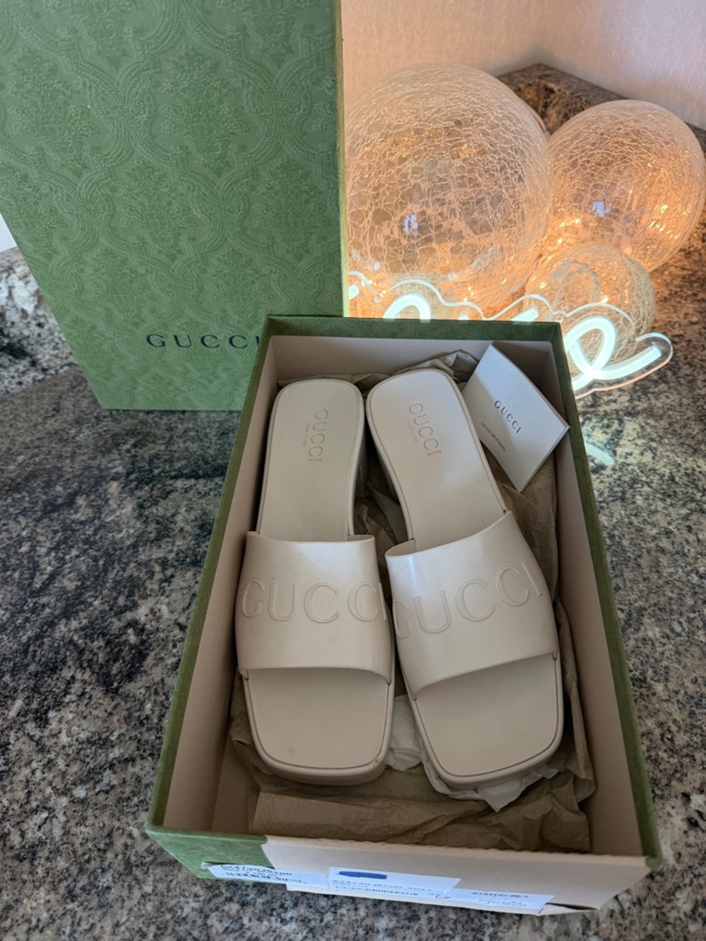 Gucci Women's Ivory Embossed Logo Slide Sandals - Picture 6 of 15